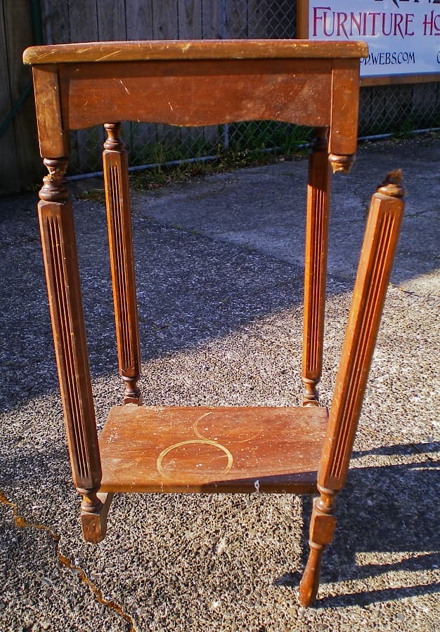 This sad little table had several breaks and damaged finish.